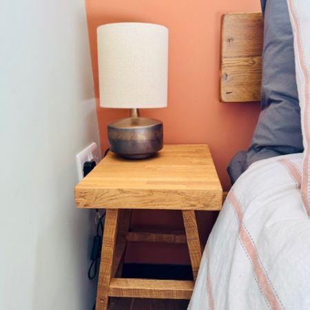 bedside tables and bed